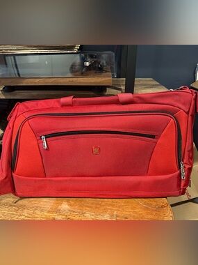 SwissGear Red Garment travel duffel with red lego